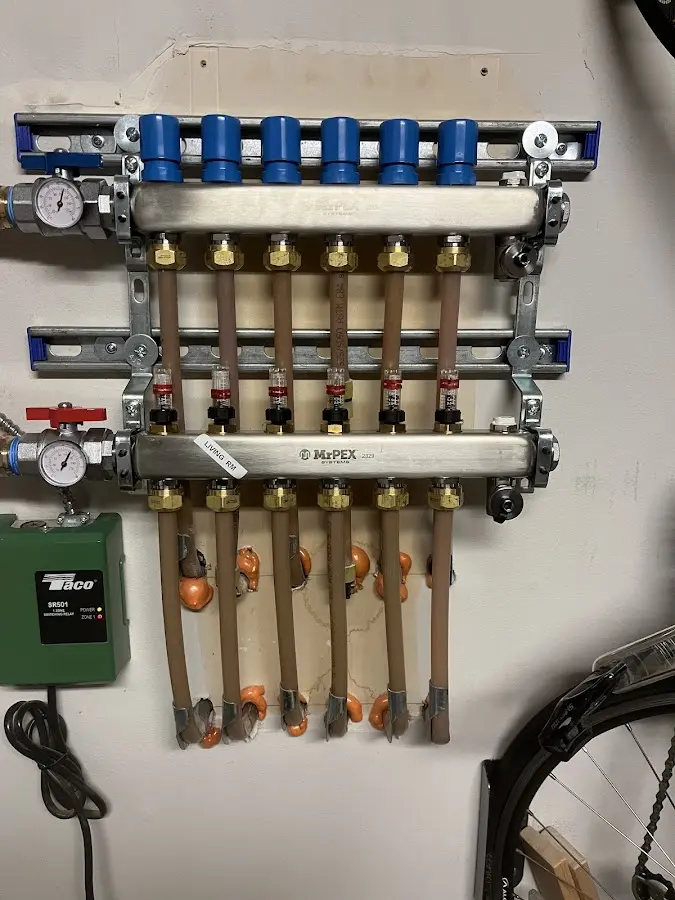 Plumber performing Water Heater Repair at a residential property in Alexander City